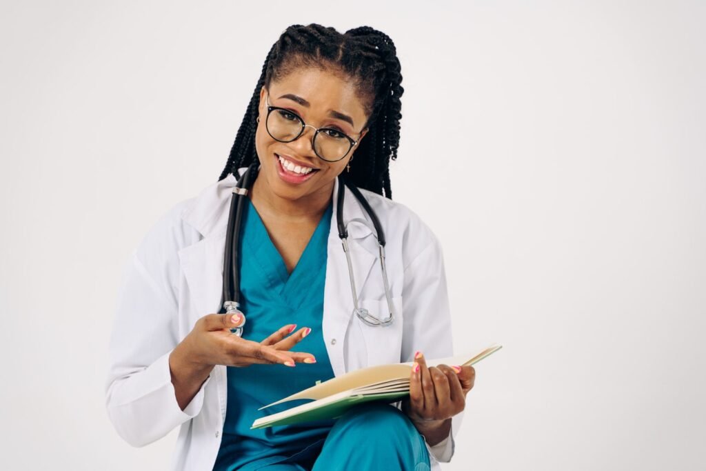 Doctor discussing tummy tuck options with a patient, illustrating the tummy tuck for FUPA guide